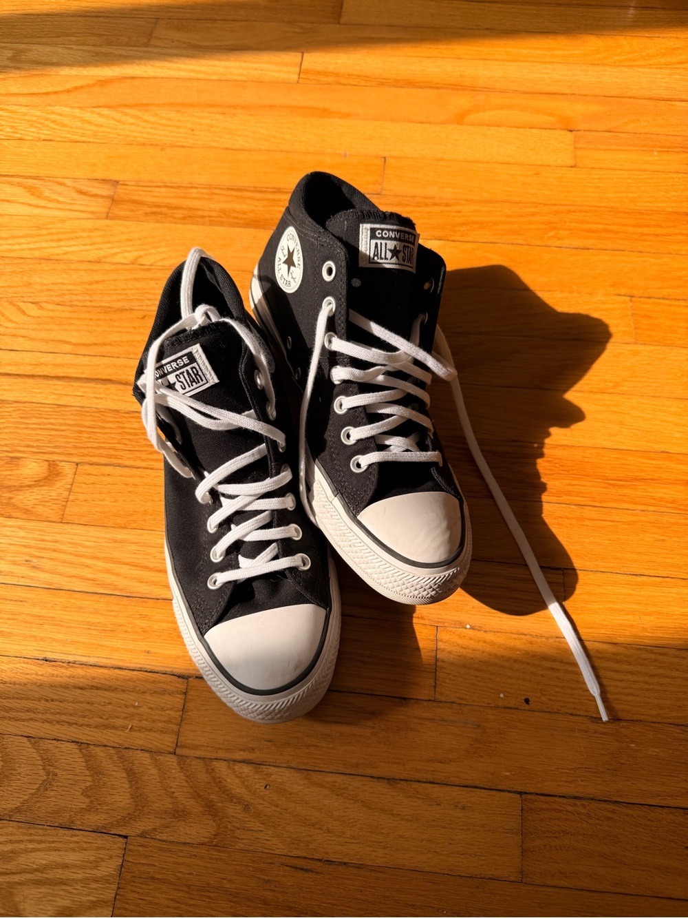 Converse Black and White High Top Women’s Sneakers